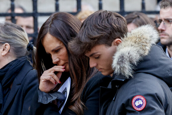 Nathalie Marquay et son fils Tom - La famille de Jean-Pierre Pernaut à la sortie des obsèques en la Basilique Sainte-Clotilde à Paris le 9 mars 2022. © Cyril Moreau/Bestimage