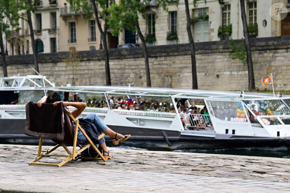 Illustration de l'édition 2022 de Paris Plage, sur les berges de Seine à Paris, France, le 21 juillet 2022. © Federico Pestellini/panoramic/bestimage  Illustration of the 2022 edition of Paris Plage, on the banks of the Seine in Paris, France, on July 21, 2022. 