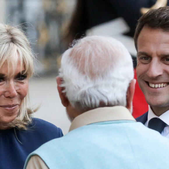 Le président de la république française, Emmanuel Macron et sa femme la première dame, Brigitte Macron recoivent pour un dîner le Premier ministre de la République de l'Inde, Narendra Modi, au palais présidentiel de l'Elysée, à Paris, France, le 13 juillet 2023. © Stéphane Lemouton/Bestimage