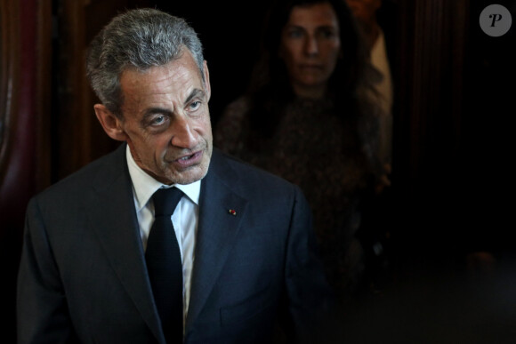 L'ancien président français Nicolas Sarkozy quitte le palais de justice du procès en appel d'une affaire de corruption au palais de justice de Paris le 17 mai 2023. © Stéphane Lemouton / Bestimage 