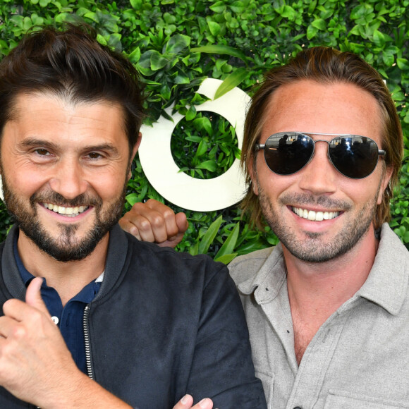 Christophe Beaugrand, son mari Ghislain Gerin - Soirée d'anniversaire des 5 ans de la marque Joone, sur la péniche La Barge à Issy-les-Moulineaux. Paris, le 30 juin 2022 © Veeren / Bestimage