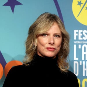 Karin Viard (présidente du jury) au photocall de la cérémonie d'ouverture du 26ème festival international du film de comédie de l'Alpe d'Huez le 16 janvier 2023.