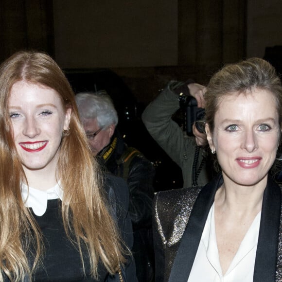 Karin Viard et sa fille aînée Marguerite - Arrivées au défilé de mode Lanvin prêt-à-porter collection Automne/Hiver 2014-2015 lors de la fashion week à Paris le 27 février 2014.