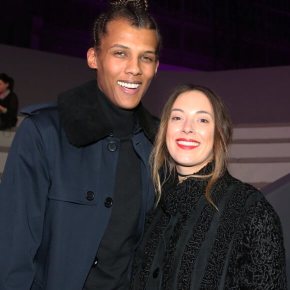 Stromae et sa femme Coralie Barbier au défilé "Victoria's Secret Paris 2016" au Grand Palais à Paris, le 30 novembre 2016.