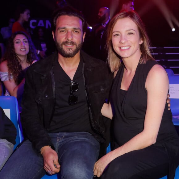 Maxim Nucci (Yodelice) et sa compagne Isabelle Ithurburu - Maxim Nucci (Yodelice) et sa compagne enceinte Isabelle Ithurburu assistent au match de boxe de Tony Yoka au palais des sports de Paris, le 23 juin 2018 © Veeren-CVS/Bestimage