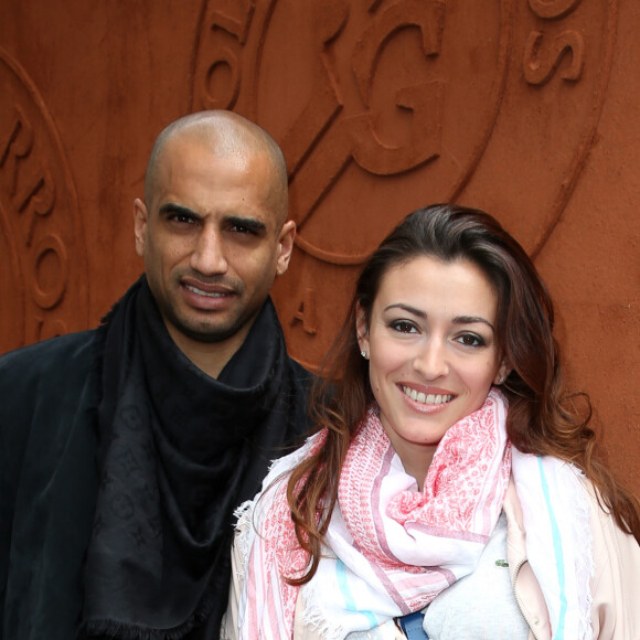 En 2011 en effet, Rachel Legrain-Trapani pensait avoir trouvé l'homme de sa vie en la personne d'Aurélien Capoué, ancien footballeur professionnel, qu'elle a fini par épouser en juin 2013.
Aurélien Capoue et sa femme Rachel Legrain-Trapani - People au village des Internationaux de France de tennis de Roland Garros à Paris, le 28 mai 2014.