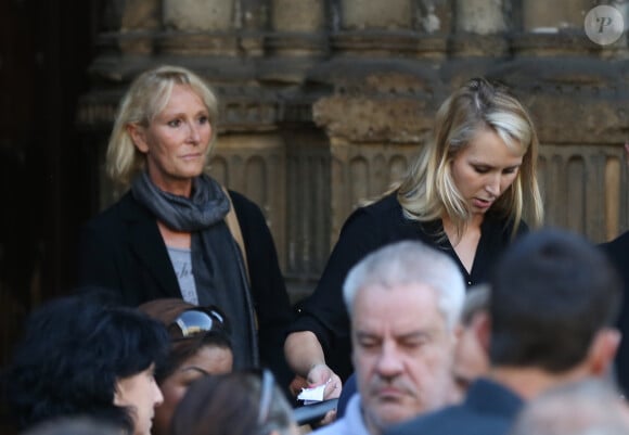 Marion Maréchal-Le Pen et sa mère Yann Le Pen - Obsèques de Roger Auque en l'église Saint-Germain-des-Près à Paris le 12 septembre 2014.