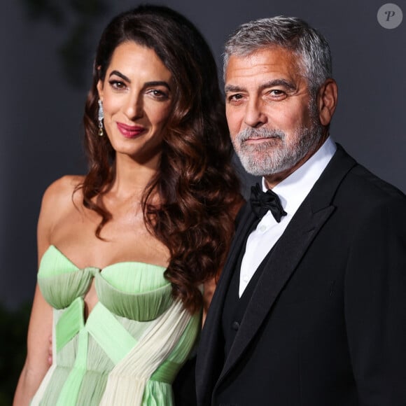 George Clooney se sépare de la villa Oleandra
Amal Alamuddin Clooney, George Clooney au photocall du "2nd Annual Academy Museum Gala" à Los Angeles.