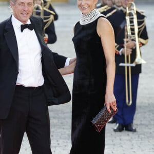 Hugh Grant et sa femme Anna Elisabet Eberstein - Dîner d'Etat au château de Versailles en l'honneur de la visite officielle du roi et de la reine d'Angleterre en France (20 - 22 septembre 2023), le 20 septembre 2023. 150 invités triés sur le volet ont été conviés à cette occasion. © Jacovides-Moreau / Bestimage 