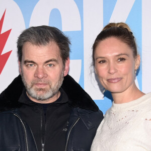 Clovis Cornillac avec sa femme Lilou Fogli à l'avant-première du film "Choeur de Rocker" au Cinema UGC Normandie à Paris le 8 décembre 2022. © Federico Pestellini / Panoramic / Bestimage