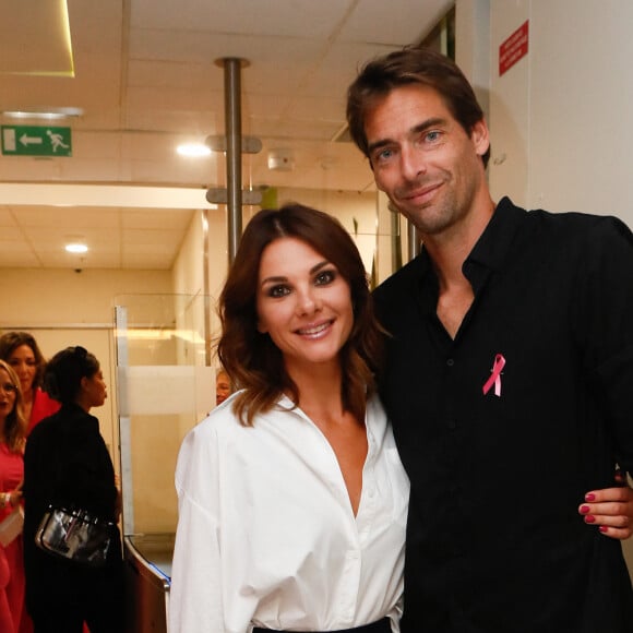 Exclusif - Alice Detollenaere, Camille Lacourt - Backstage du défilé de l'association Ruban Rose à l'occation du lancement d'octobre rose sur les Champs Elysées à Paris, France, le 01 octobre 2023. Cette année, l'association Ruban Rose à l'origine du projet fête ses 20 ans. À l'occasion du 1er octobre, elle a réuni sur les Champs-Elysées 99 femmes et 1 homme, atteints, en rémission ou guéris du cancer du sein, aux côtés de 100 blouses blanches (chercheurs, médecins, soignants). E. Dhéliat, C. Tagbo et A. Detollenaere, marraines de l'association et touchées elles aussi par le cancer du sein, étaient présentes à leurs côtés. Au fil des éditions, certaines se réengagent et poursuivent ainsi la dynamique de cohésion et de soutien auprès de l'association Ruban Rose. L'évènement a été mis en musique par la chanteuse Jenifer et chorégraphié par M.Kerkouche. Trois monuments emblématiques français se sont illuminés en rose pour contribuer à la sensibilisation aux côtés de l'Association : l'Arc de Triomphe, la tour Eiffel, et l'Assemblée nationale. © Christophe Clovis / Bestimage 