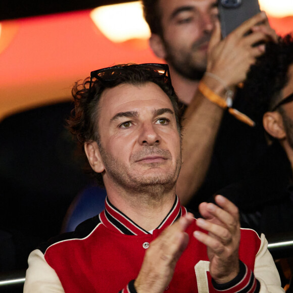 Michaël Youn - People dans les tribunes du match de Ligue des champions entre le PSG et le Borussia Dortmund (2-0) au Parc des Princes à Paris le 19 septembre 2023. © Cyril Moreau/Bestimage