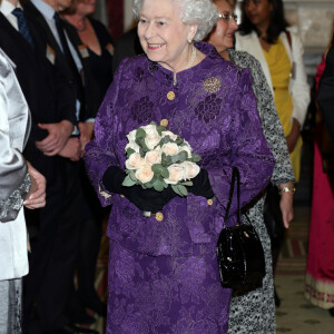 La reine Elisabeth II d'Angleterre, accompagnée du prince Philip, duc d'Edimbourg, assiste à une réception à l'occasion du Commonwealth Day à la Malborough House à Londres. Le 9 mars 2015 