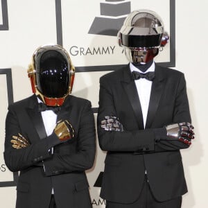 Le duo iconique de la musique électro a toujours porté un masque
 
Daft Punk - 56eme ceremonie des Grammy Awards a Los Angeles, le 26 janvier 2014.