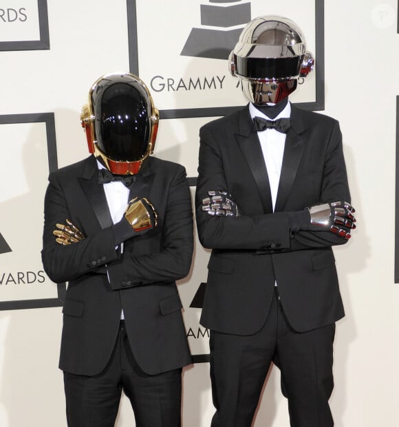 Le duo iconique de la musique électro a toujours porté un masque
 
Daft Punk - 56eme ceremonie des Grammy Awards a Los Angeles, le 26 janvier 2014.