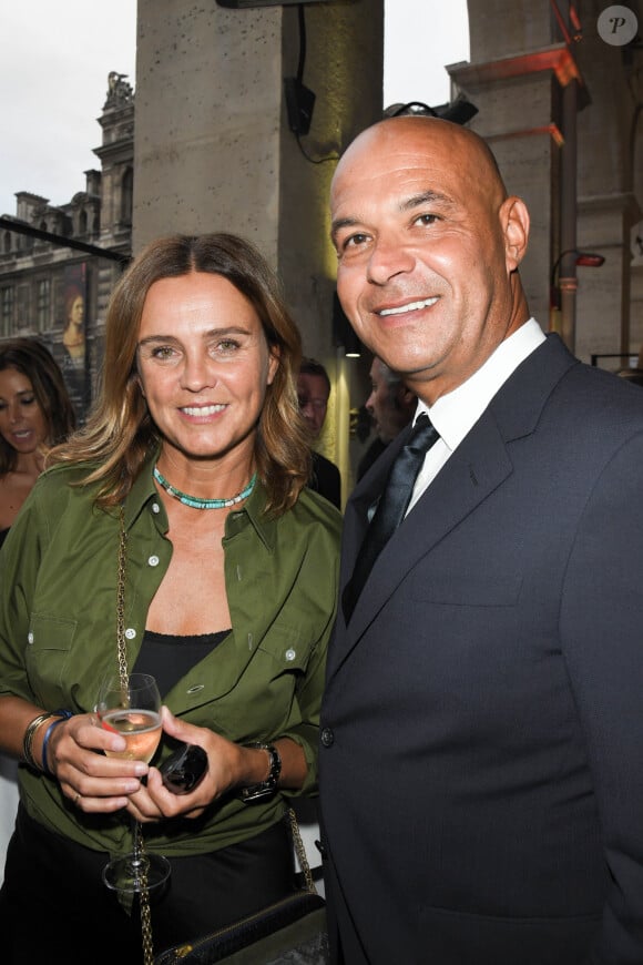 Exclusif - Marine Vignes et Jérôme Bocuse (Président de Pôl Développement) lors de la soirée d'inauguration de la brasserie Paul Bocuse dans l'hôtel du Louvre, dans le 1er arrondissement de Paris, France, le 12 septembre 2019. La première table Bocuse a ouvert ses portes dans la ville lumière, trouvant sa place dans le magnifique quartier du Louvre. Après Lyon, les Etats-Unis et le Japon, la « brasserie du Louvre » vient compléter la famille Bocuse, au sein de cet écrin magnifique qu’est l’Hôtel du Louvre superbement rénové par le groupe Hyatt. La gastronomie lyonnaise est enfin au rendez-vous pour les parisiens et les millions de touristes qui visitent notre capitale. Gourmands, curieux, venez découvrir la délicieuse cuisine de Monsieur Paul, le cuisinier du siècle. Les fameuses quenelles de brochet, le poulet de brosse à la crème et aux champignons, le gratin de Macaroni à la lyonnaise ou encore les célèbres gaufres « grand-mère » sont évidemment à la carte... Nos Chefs vous régalent ! Fidèle à notre histoire, à nos valeurs, à notre exigence, les Maisons Bocuse continueront à faire rayonner l’art culinaire tricolore, et cette magnifique inauguration de la Brasserie du Louvre ce 12 septembre marque la première étape d’une nouvelle aventure. Ici, vous mangerez, vous ne dégusterez pas : « Avec des os et des arêtes » comme disait souvent Monsieur Paul.© Coadic Guirec/Bestimage  No Web pour la Belgique et la Suisse Exclusive - For Germany Call For Price - Celebs atteding the Paul Bocuse brewery Inauguration evening at the Louvre Hotel, in Paris, France, on September 12, 201 