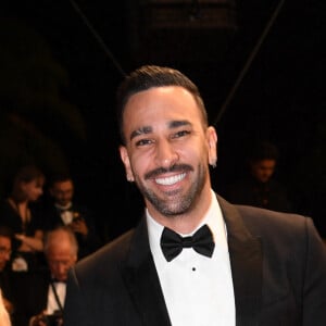 Adil Rami - Montée des marches du film "Novembre" lors du 75ème Festival International du Film de Cannes, le 22 mai 2022. © Rachid Bellak / Bestimage 