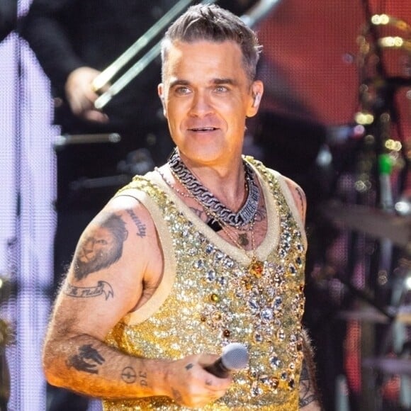 notamment sur cette période particulièrement inquiétante de sa vie où il admet qu'il...
Concert de Robbie Williams à Birmingham dans le cadre de sa tournée pour les 25 ans de carrière solo le 15 octobre 2022. 