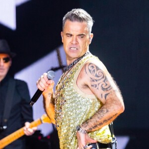 ne mangeait qu'une banane par jour, survivant avec 90 calories.
Concert de Robbie Williams à Birmingham dans le cadre de sa tournée pour les 25 ans de carrière solo le 15 octobre 2022. 