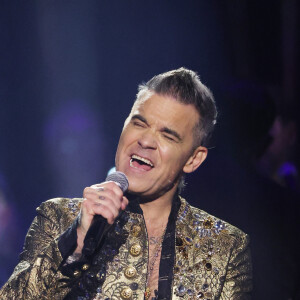 Robbie Williams sur le plateau de l'émission "Your Songs" à Leipzig, le 16 novembre 2022.
