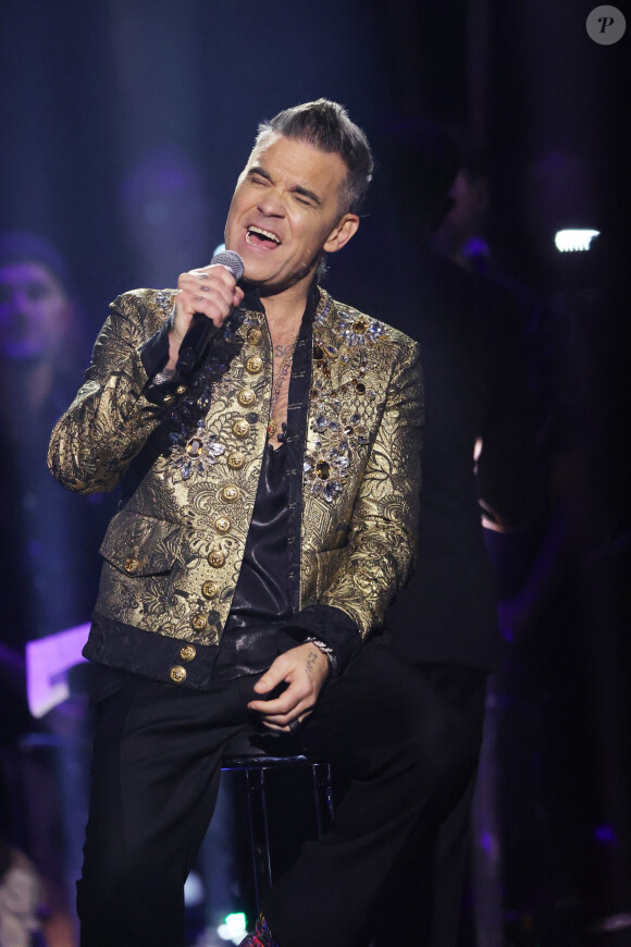 Robbie Williams sur le plateau de l'émission "Your Songs" à Leipzig, le 16 novembre 2022.