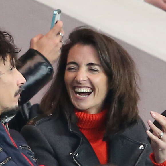 Sa fille a en effet eu un premier enfant avec l'humoriste Arnaud Tsamère, passionné de sport automobile comme elle
Arnaud Tsamère et Margot Laffite - People assistent au match de coupe de France entre le Psg et Lyon au Parc des Princes à Paris le 10 février 2016. © Cyril Moreau/Bestimage