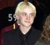 Mais de son rival dans la saga : Malfoy, incarné par Tom Felton.
Robbie Coltrane, Rupert Grint, Emma Watson et Tom Felton - Lancement du DVD du film "Harry Potter à l'école des sorciers". Londres. Le 9 mai 2002.