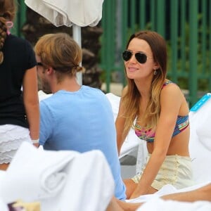 Tom Felton, héros de Harry Potter, en vacances à la plage à Miami avec sa petite amie Jade Olivia, le 29 décembre 2012