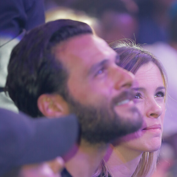 Maxim Nucci (Yodelice) et sa compagne enceinte Isabelle Ithurburu - Maxim Nucci (Yodelice) et sa compagne enceinte Isabelle Ithurburu assistent au match de boxe de Tony Yoka au palais des sports de Paris, le 23 juin 2018 © Veeren-CVS/Bestimage