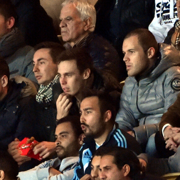 Michael Ducruet, à gauche, et son frère Louis, fils de la Princesse Stéphanie sont au stade Louis II pour le match Monaco / Marseille où le Prince Albert II de Monaco a assisté au début du match et à la célébration des 90 ans du Club en compagnie de la plupart des anciens joueurs tels que, Lilian Thuram, Marco Simone, Emmanuel Amoros et bien d'autres. Il à ensuite quitté le stade pour rejoindre son épouse la Princesse Charlene et leurs enfants Gabriella et Jaçques à la maternité le 14 décembre 2014. 