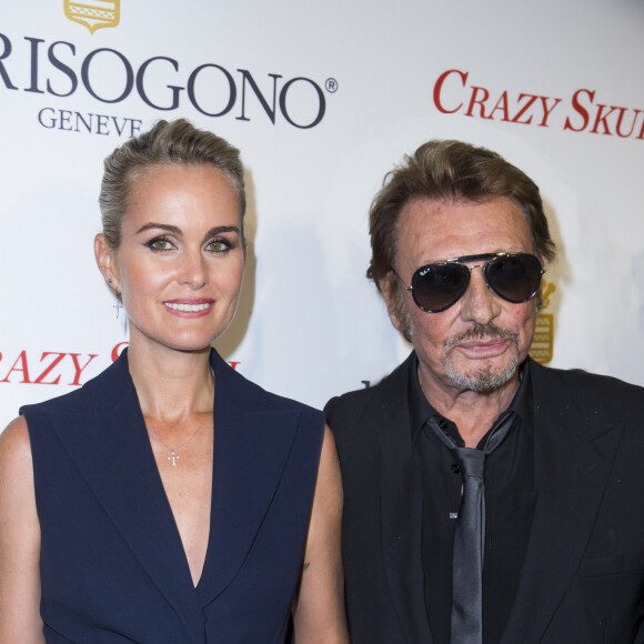 Johnny et Laeticia Hallyday - Inauguration du Show Room Parisien De Grisogono et lancement de la montre "Crazy Skull" à Paris le 23 octobre 2014. 