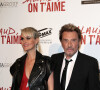Johnny Hallyday et sa femme Laeticia - Avant-première de 'Salaud on t'aime' à l'UGC Normandie sur les Champs-Elysées à Paris le 31 mars 2014.