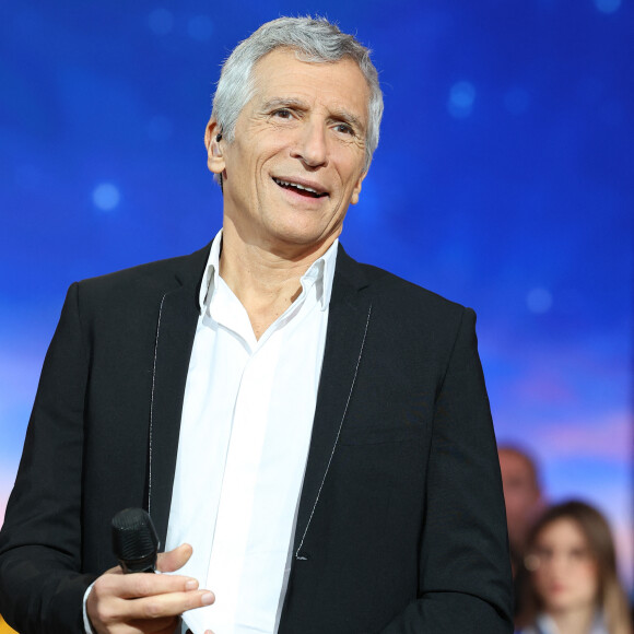 Mais il ne comprend toujours pas pourquoi Nagui ne l'a jamais invité dans "Taratata".
Nagui - Les personnalités se mobilisent lors de la 37ème édition du Téléthon sur le plateau de France 2, avec pour parrain Vianney. Cette année, 80,6 millions de dons ont été promis. Le 9 décembre 2023. © Coadic Guirec / Bestimage 