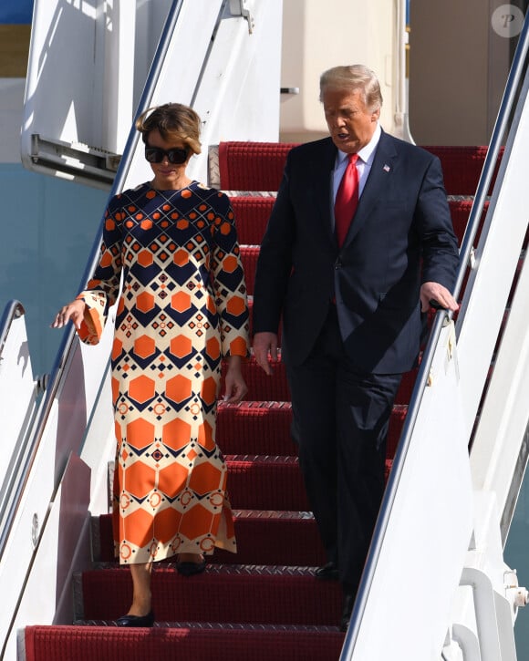 Donald Trump et sa femme Melania - La famille Trump débarque de Air Force One à l'aéroport international de Palm Beach le 20 janvier 2021. 