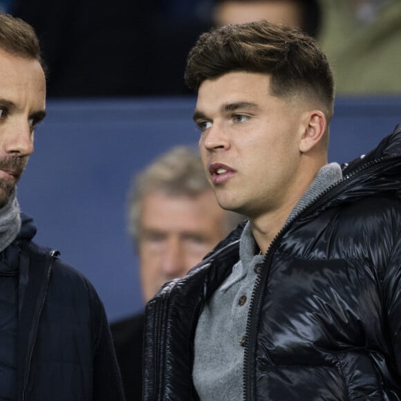 Richard Gasquet et Matthieu Jalibert - People dans les tribunes lors du match de ligue des champions entre le PSG et l'AC Milan au Parc des Princes à Paris le 25 octobre 2023. © Cyril Moreau/Bestimage