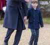 En effet, il portait un pantalon.
Le prince Louis de Galles et son père William à Sandringham, Norfolk.