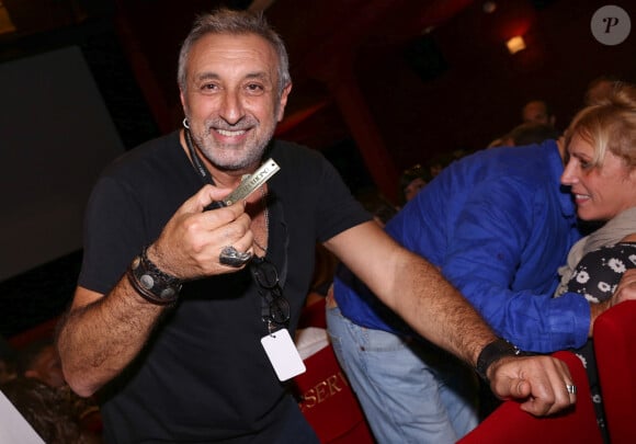 Et cela faisait longtemps qu'on ne l'avait pas vu à la télé. 
Exclusif - Gérard Pullicino et sa compagne Sam lors de la 4ème édition du Festival de l'humour court à La Ciotat, le 11 octobre 2014.