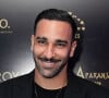 Adil Rami complimente une chanteuse française
 
Exclusif - Adil Rami - Soirée à la suite Sandra & Co lors du 76ème Festival International du Film de Cannes. © Aurelio Stella /Bestimage