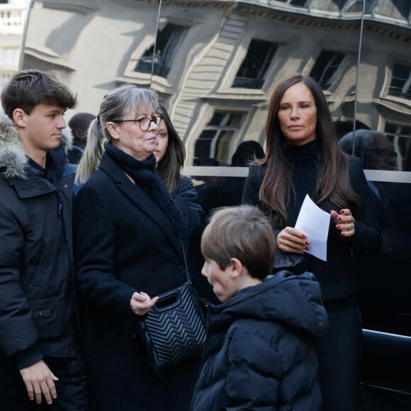 Tom, fils de Jean-Pierre Pernaut, Nathalie Marquay, Léo, petit fils de Jea-Pierre Pernaut - Sorties des obsèques de Jean-Pierre Pernaut en la Basilique Sainte-Clotilde à Paris le 9 mars 2022. © Christophe Clovis / Bestimage