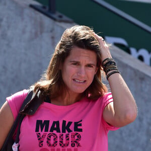 "Humiliations, chantage, insultes" rythmaient ainsi les journées de l'ancienne joueuse de tennis. 
Amélie Mauresmo enceinte - People dans les tribunes des Internationaux de France de tennis de Roland Garros le 3 juin 2015. 