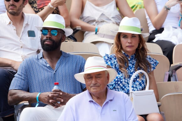 Ariane Brodier et son compagnon Fulgence Ouedraogo en tribunes lors des Internationaux de France de tennis de Roland Garros 2023, à Paris, le 8 juin 2023. © Jacovides-Moreau/Bestimage