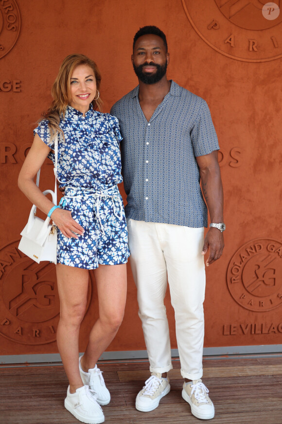 Ariane Brodier et son compagnon Fulgence Ouedraogo au village lors des Internationaux de France de tennis de Roland Garros 2023, à Paris, le 8 juin 2023. © Jacovides-Moreau/Bestimage