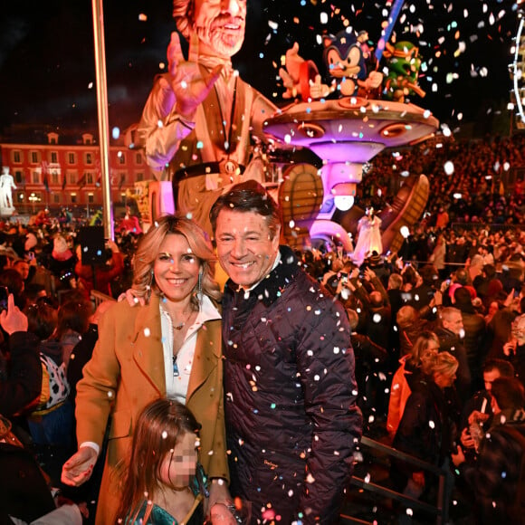 Christian Estrosi, le maire de Nice, sa femme, Laura Tenoudji Estrosi qui fête ses 48 ans, et leur fille Bianca durant le premier corso carnavalesque illuminé du Carnaval de Nice 2024 "Roi de la Pop Culture", le 17 février 2024.