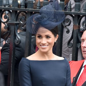 Meghan Markle, duchesse de Sussex (habillée en Dior Haute Couture par Maria Grazia Chiuri) - La famille royale d'Angleterre à la sortie de l'abbaye de Westminster pour le centenaire de la RAF à Londres. Le 10 juillet 2018 