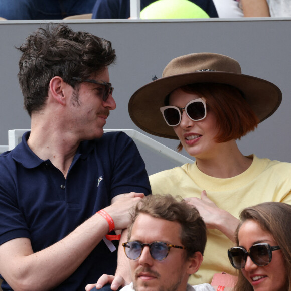 Grégory Nicolaidis, Elodie Frégé en tribunes lors des Internationaux de France de tennis de Roland Garros à Paris, France, le 26 mai 2022.