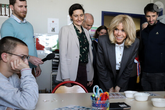 Amélie Oudéa-Castéra, Ministre des Sports et des Jeux Olympiques et Paralympiques, Brigitte Macron, Tony Estanguet, président de Paris 2024 lors de la visite de l'Institut médico-éducatif Léonce Malécot, de l'association "Les Papillons Blancs de la Colline", à Saint-Cloud dans les Hauts-de-Seine dans le cadre de la Semaine Olympique et Paralympique 2024, le 3 avril 2024. © Stéphane Lemouton / Bestimage 