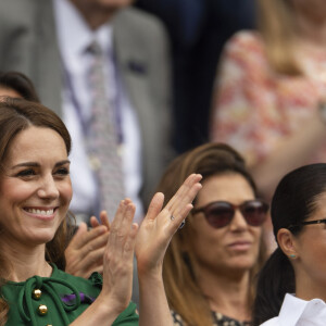 Catherine (Kate) Middleton, duchesse de Cambridge, Meghan Markle, duchesse de Sussex, et Pippa Middleton dans les tribunes lors de la finale femme de Wimbledon "Serena Williams - Simona Halep (2/6 - 2/6) à Londres, le 13 juillet 2019. 