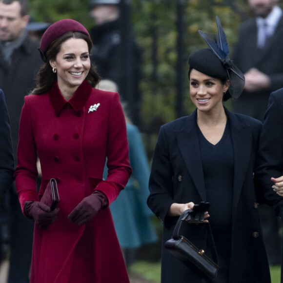Kate Middleton et Meghan Markle seraient-elles sur le chemin de la réconciliation ? 
Catherine Kate Middleton, la duchesse de Cambridge et Meghan Markle, la duchesse de Sussex enceinte - La famille royale britannique se rend à la messe de Noël à l'église Sainte-Marie-Madeleine à Sandringham.