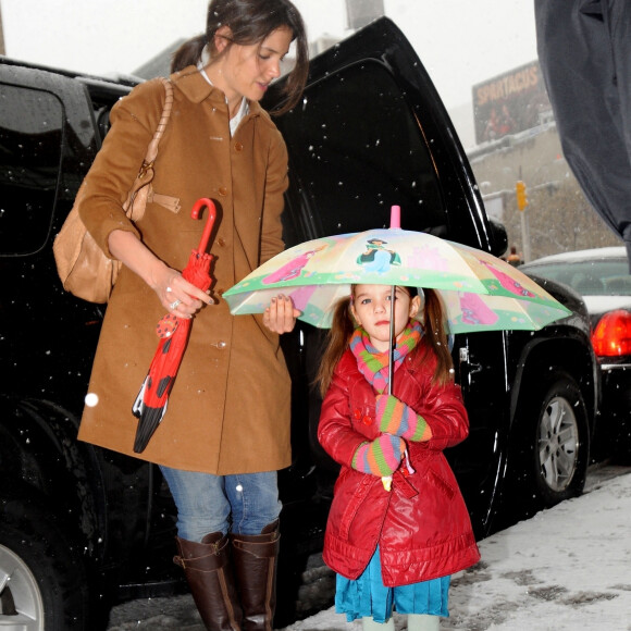New York, NY - FILE PHOTOS Suri, who is the daughter of Katie Holmes and Tom Cruise, has lived in NYC with her mother for years and has been estranged from the “Mission Impossible” star for years. She is turning 18 years old on April 18. Pictured: Suri Cruise, Tom Cruise, Katie Holmes