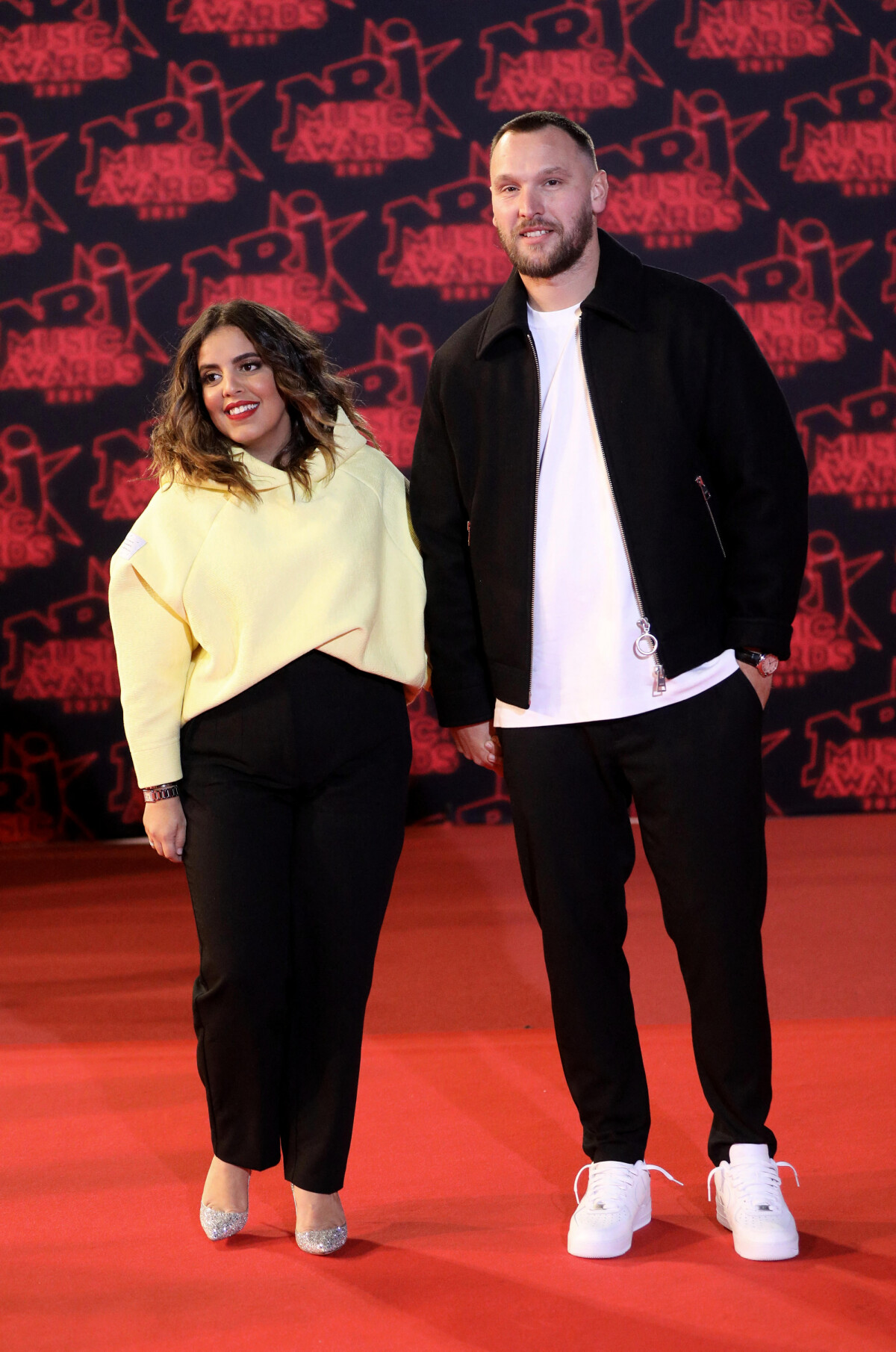 Photo : Inès Reg et son compagnon Kévin Debonne lors de la 23ème édition  des NRJ Music Awards 2021 au Palais des Festivals de Cannes, le 20 novembre  2021. © Dominique JacovidesBestimage - Purepeople